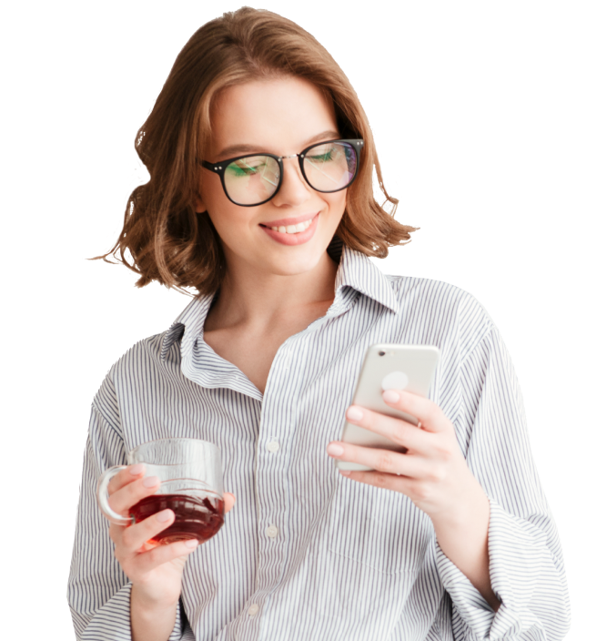 Woman smiling holding coffee and phone